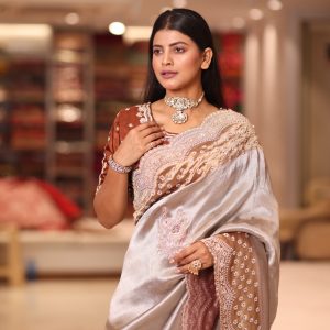 Metallic Silver-Champagne Liquid Satin Saree with Deep Copper Hand-Embroidered Cutwork Border